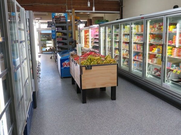 Ouse Supermarket trading as Ouse 11
