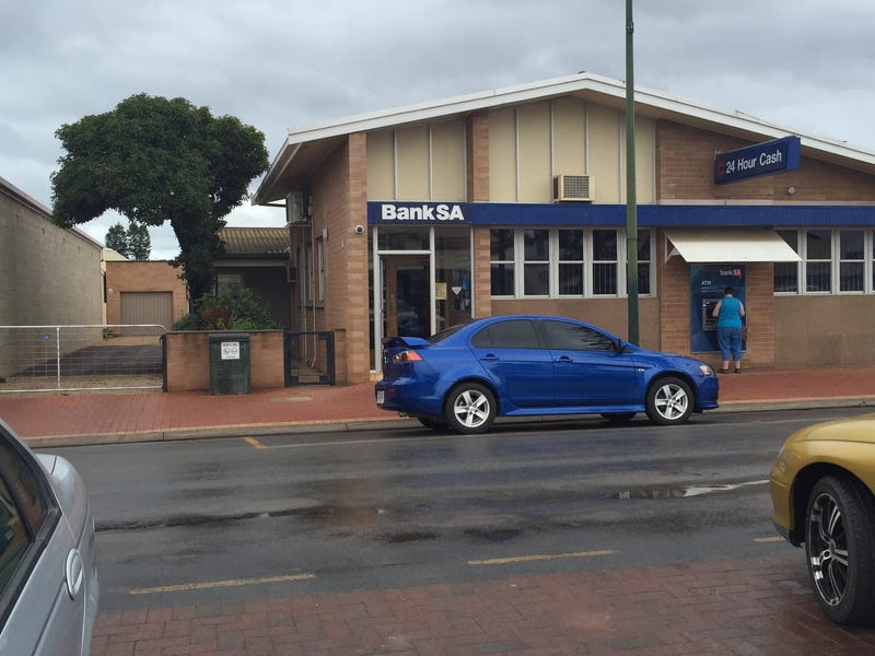 BANK WITH ATM plus attached 3 BR BRICK HOME