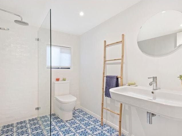 RENOVATED TWO STOREY HOME WITH 4