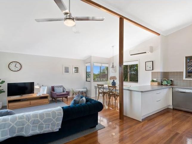 RENOVATED TWO STOREY HOME WITH 5