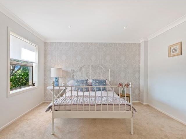 RENOVATED TWO STOREY HOME WITH 10