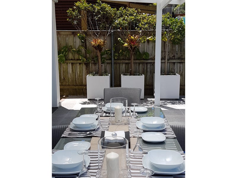 Curly Beachside Patio Apartment 9