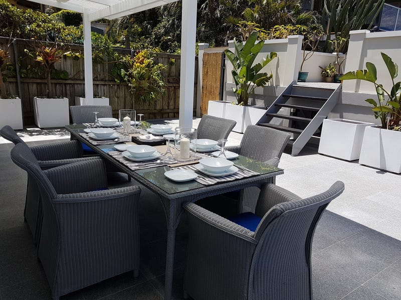 Curly Beachside Patio Apartment 11