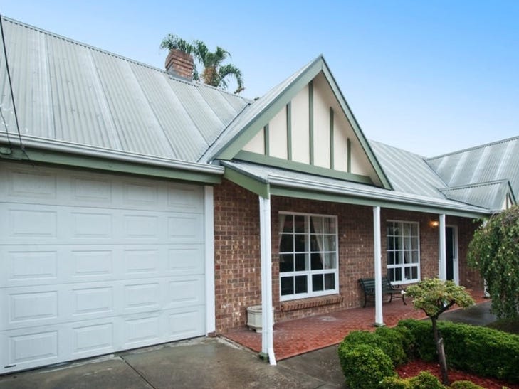 Renovated tudor style courtyard home