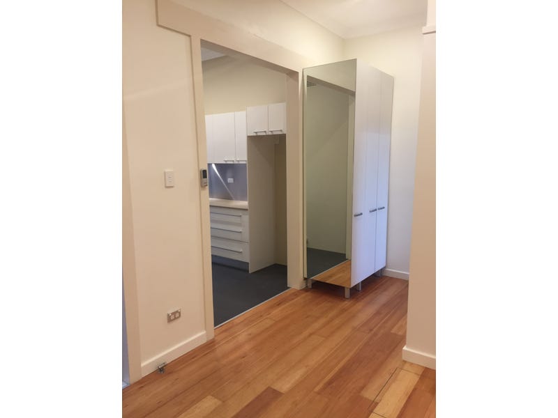 Spacious living with own hardwood 12