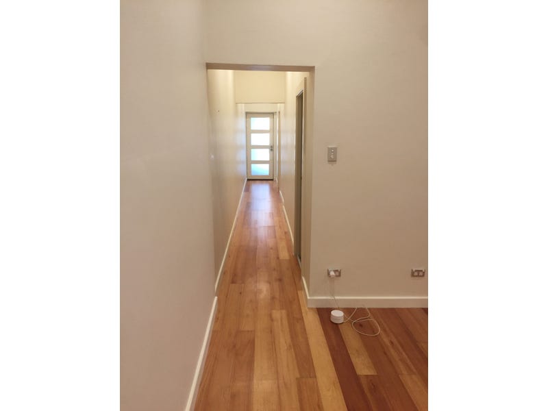 Spacious living with own hardwood 13