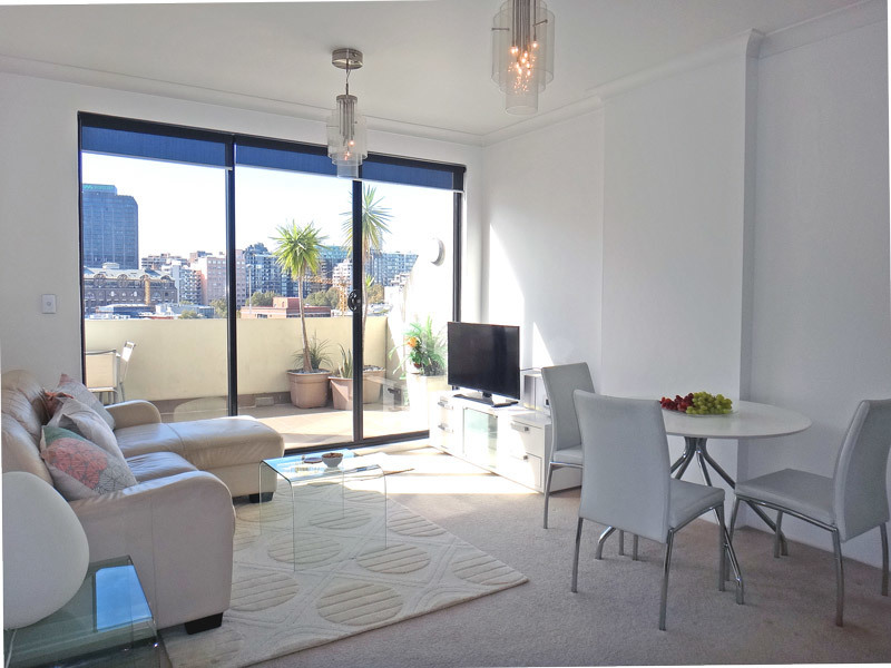 Stylishly Furnished Top-floor 1 Bedroom with Resort Facilities in the City Centre!