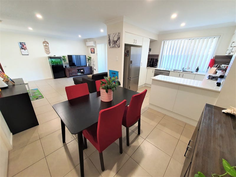 Spacious, light filled 3 bedroom town house with solar in sought after complex