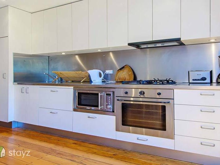 Stylish Two Level Apartment 4