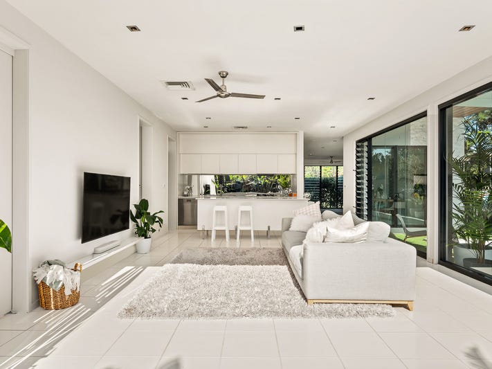 Light-filled modern home surrounded by 2