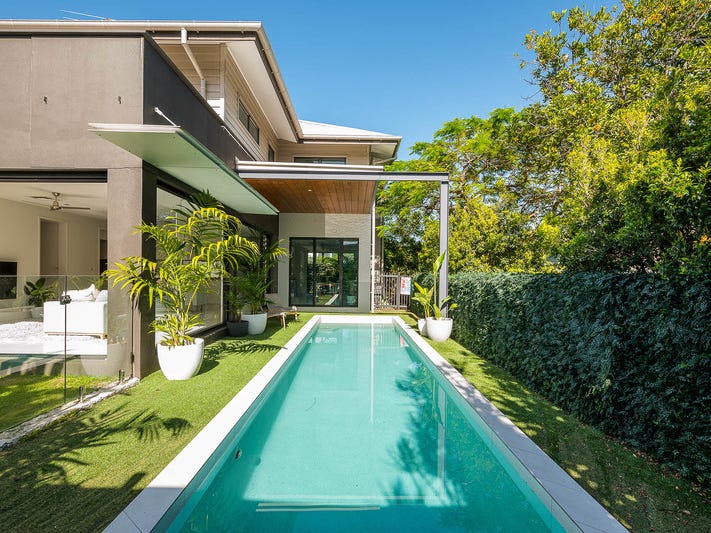 Light-filled modern home surrounded by 15