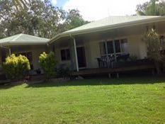 DRASTICALLY REDUCED as eldely owner needs to move into town.   STUNNING MOUNTAIN VIEWS. LARGE HOME ON 7.5 ACRES