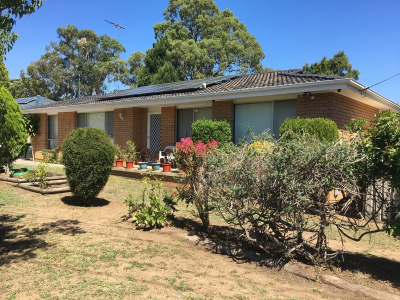 Comfortable family home or great investment in convenient location-Note entrance is in Wyatt Place