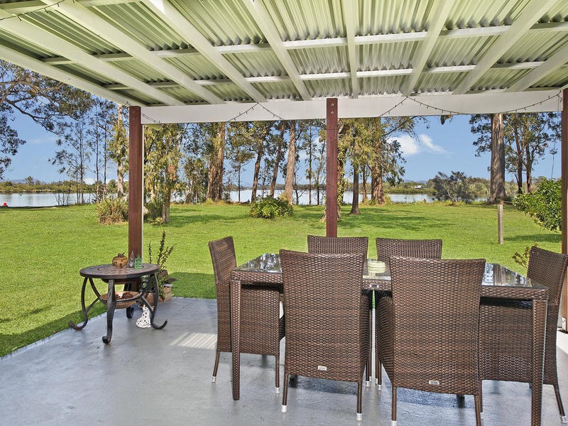 New Price- Time to chase my rainbow away from this unique Riverside Home