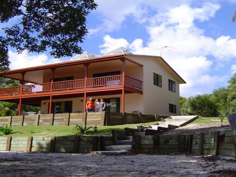 2 Houses plus Business on 1/2 an acre on Moreton Island Beachfront