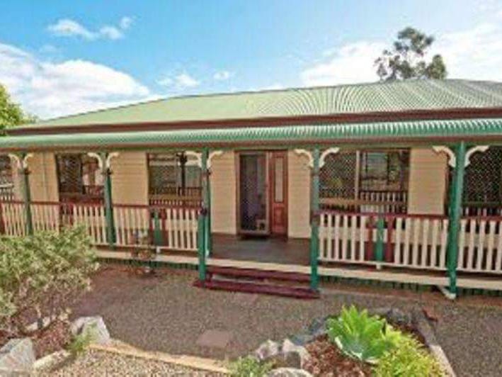 Charming one-owner queenslander with stunning 6