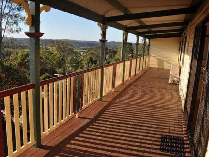 Charming one-owner queenslander with stunning 20