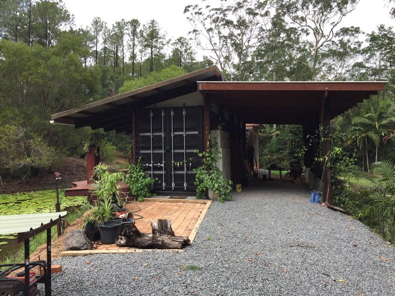 five special acres, two tiny homes, spring fed creek and dam.