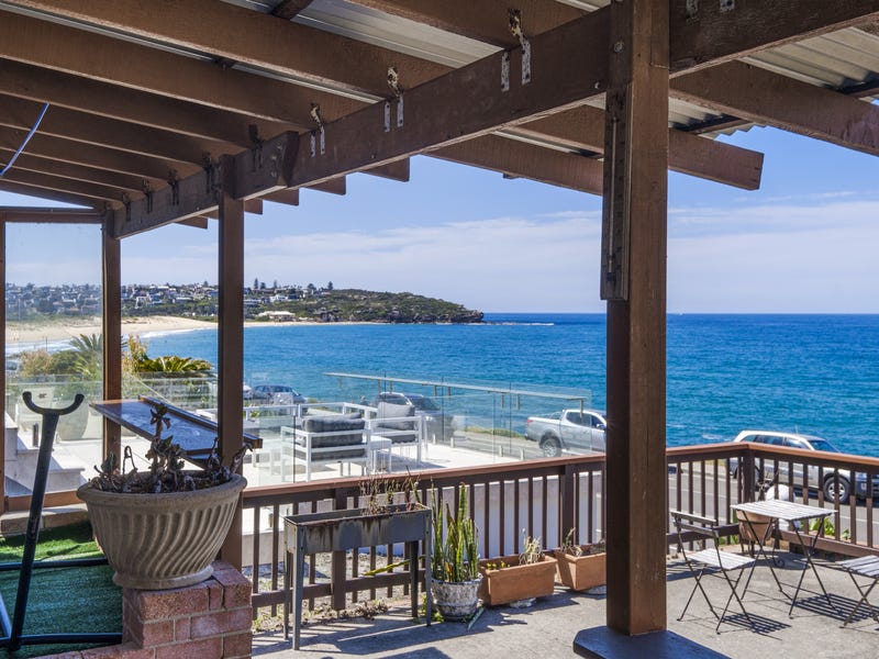RARE FRESHWATER OCEANFRONT. COMMANDING HEADLAND TO HEADLAND VIEWS.