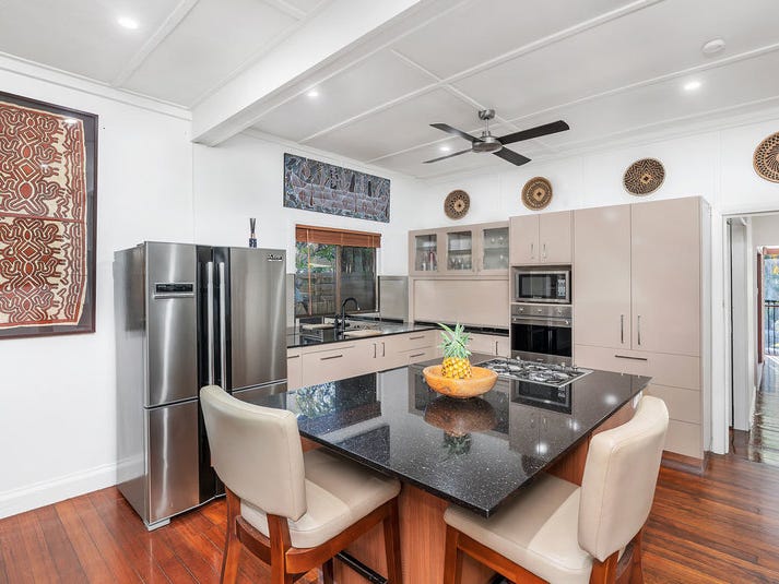 Lovingly renovated beachside tropical oasis. 2