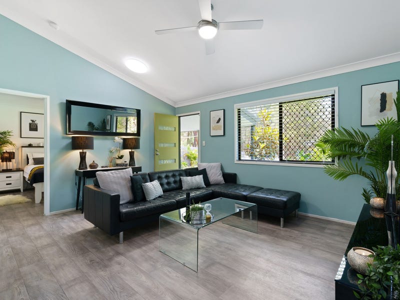 MANICURED GARDENS…. Immaculate Modern Home, White Picket Electric Fence, Shouldering a Green Zone (Nature Strip), Security Grill Fly Screens, Racked