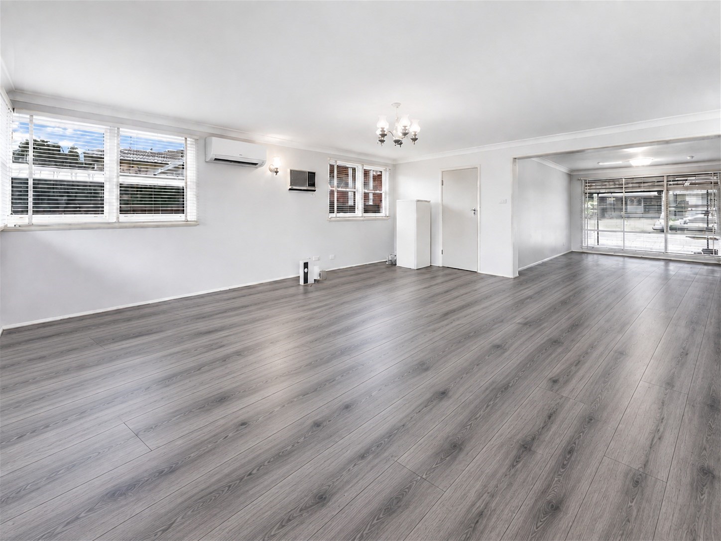 Spacious Family Living with Fresh Updates & a Separate Multipurpose Room, photo 2