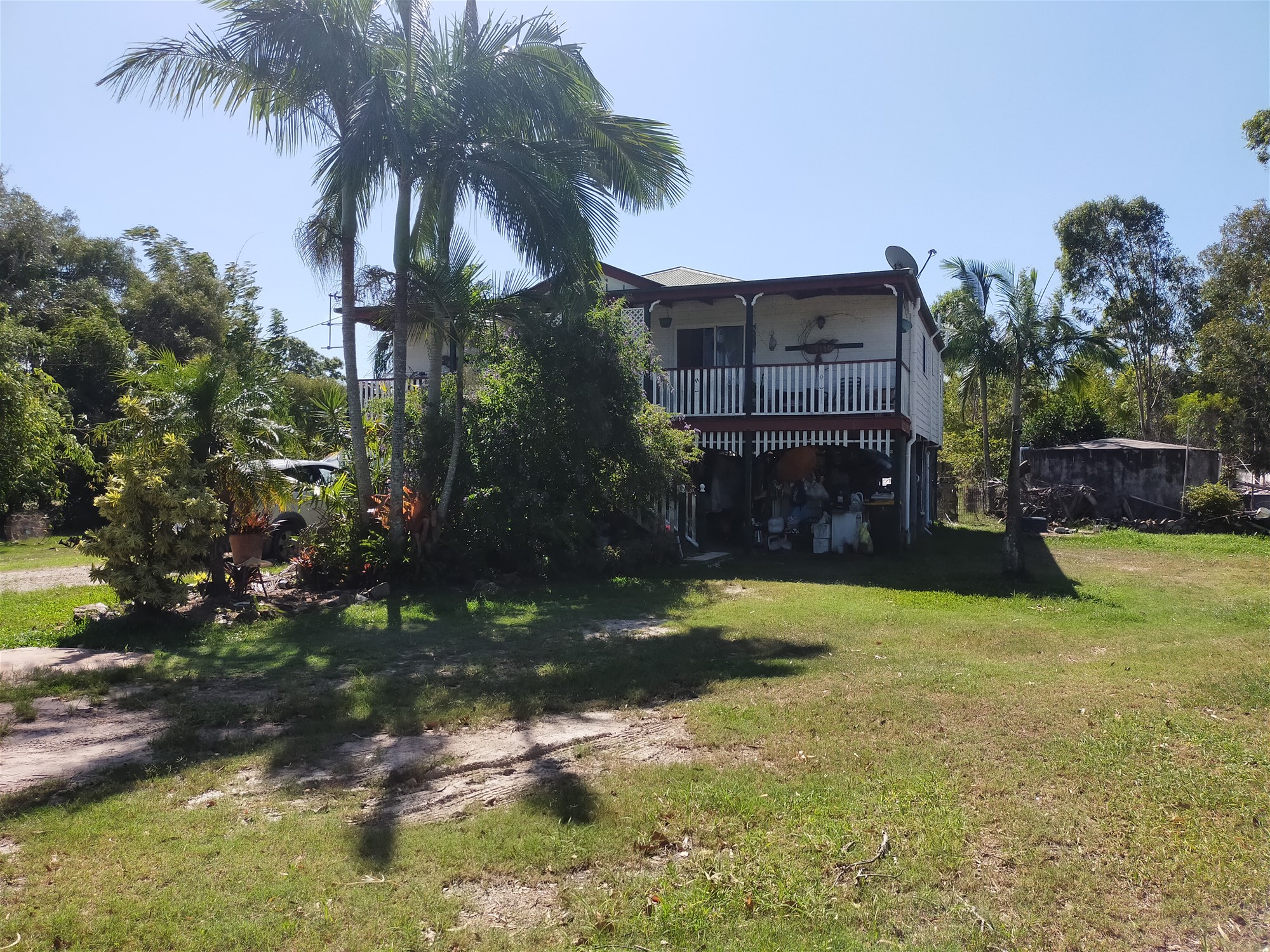 4 acres and Home close to beach