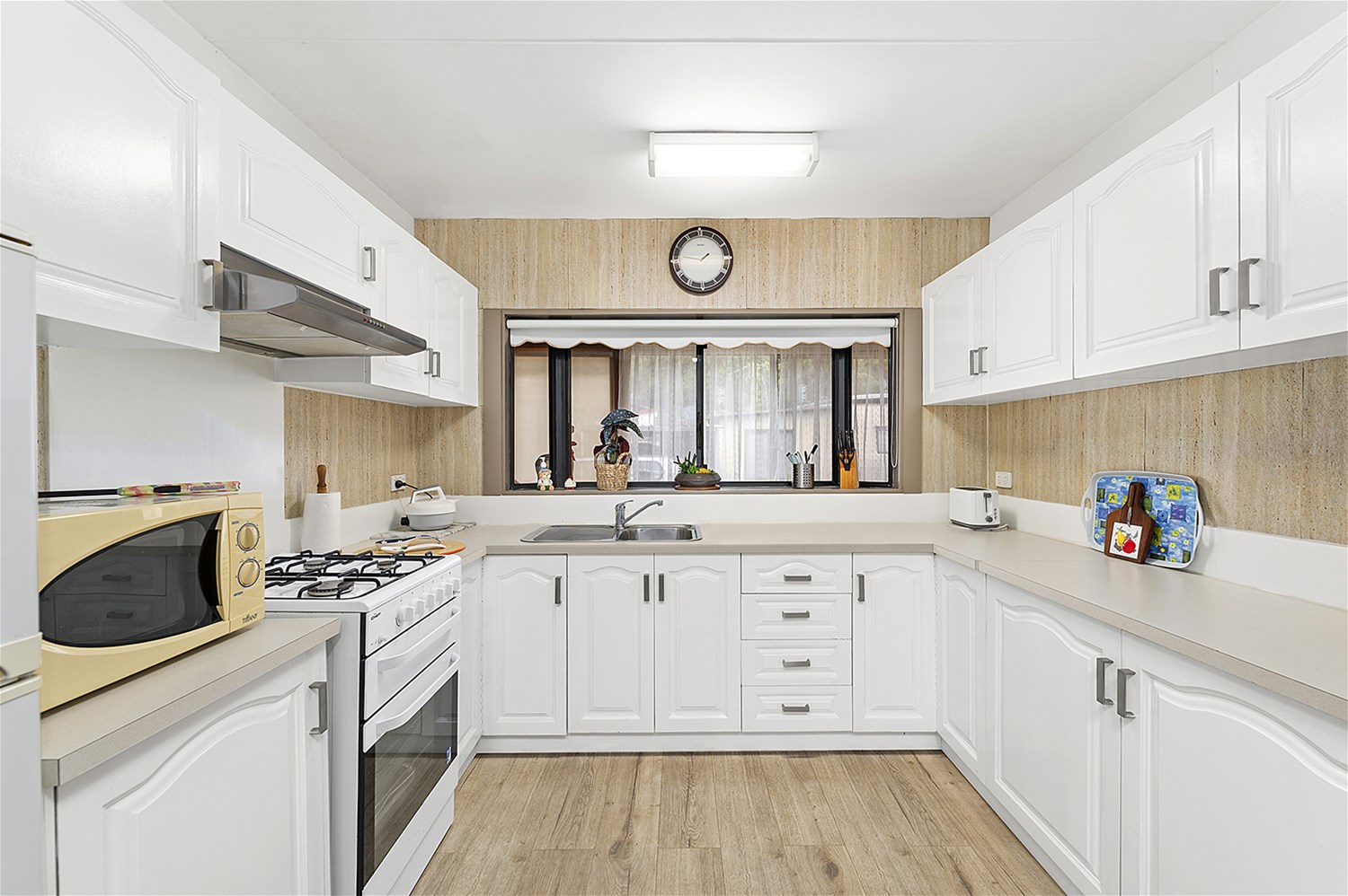 UNDER CONTRACT – Superbly Renovated – Flexible Floor Plan and Spacious – Beautiful Bathroom and Kitchen